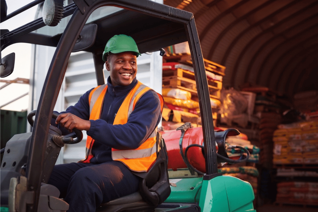 A forklift operator in a warehouse