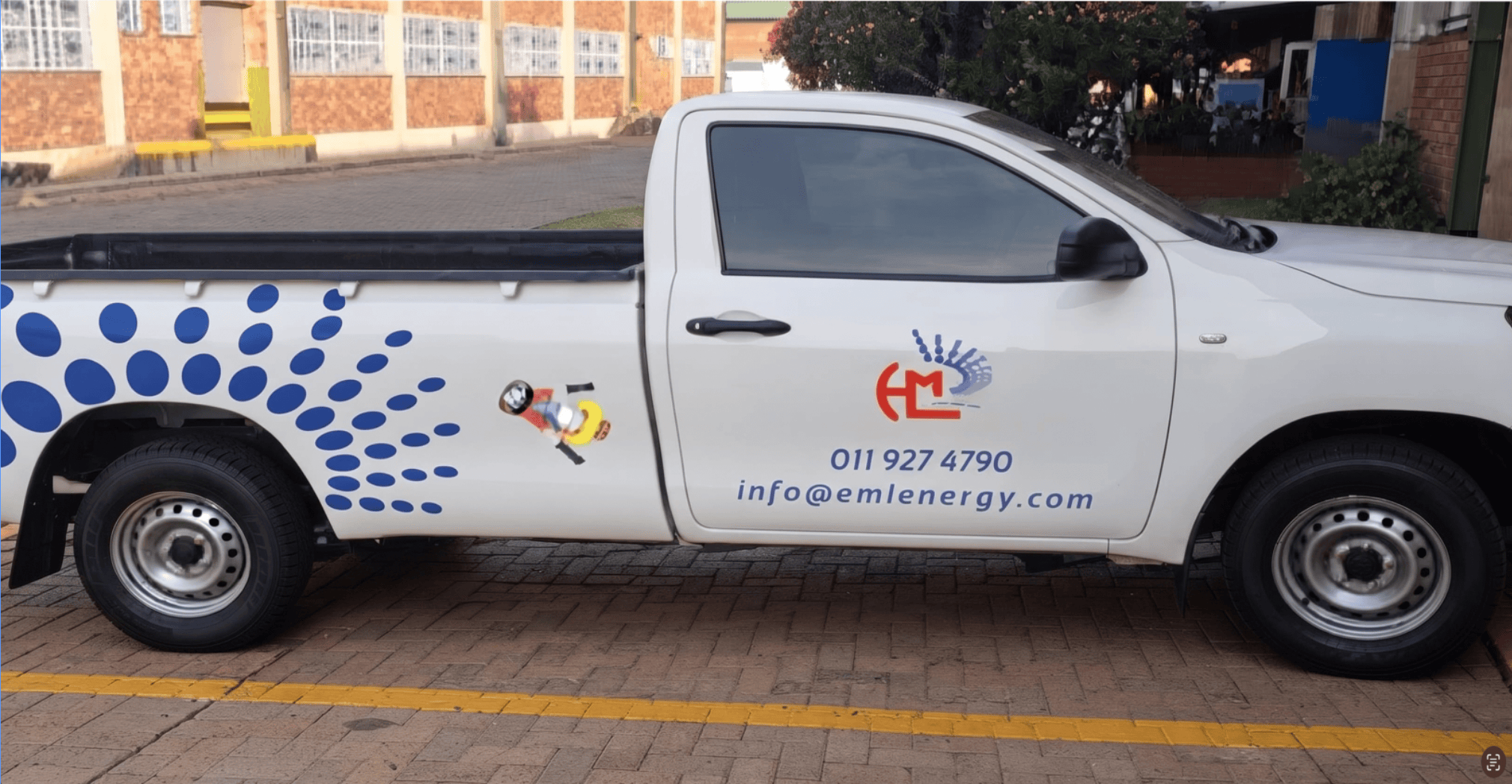 A Grid Africa Gas delivery vehicle outside a home
