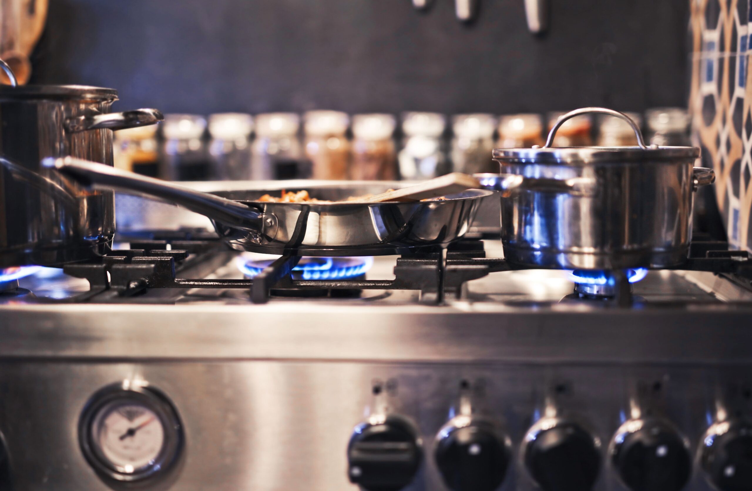 A gas stove connected and lit after installation